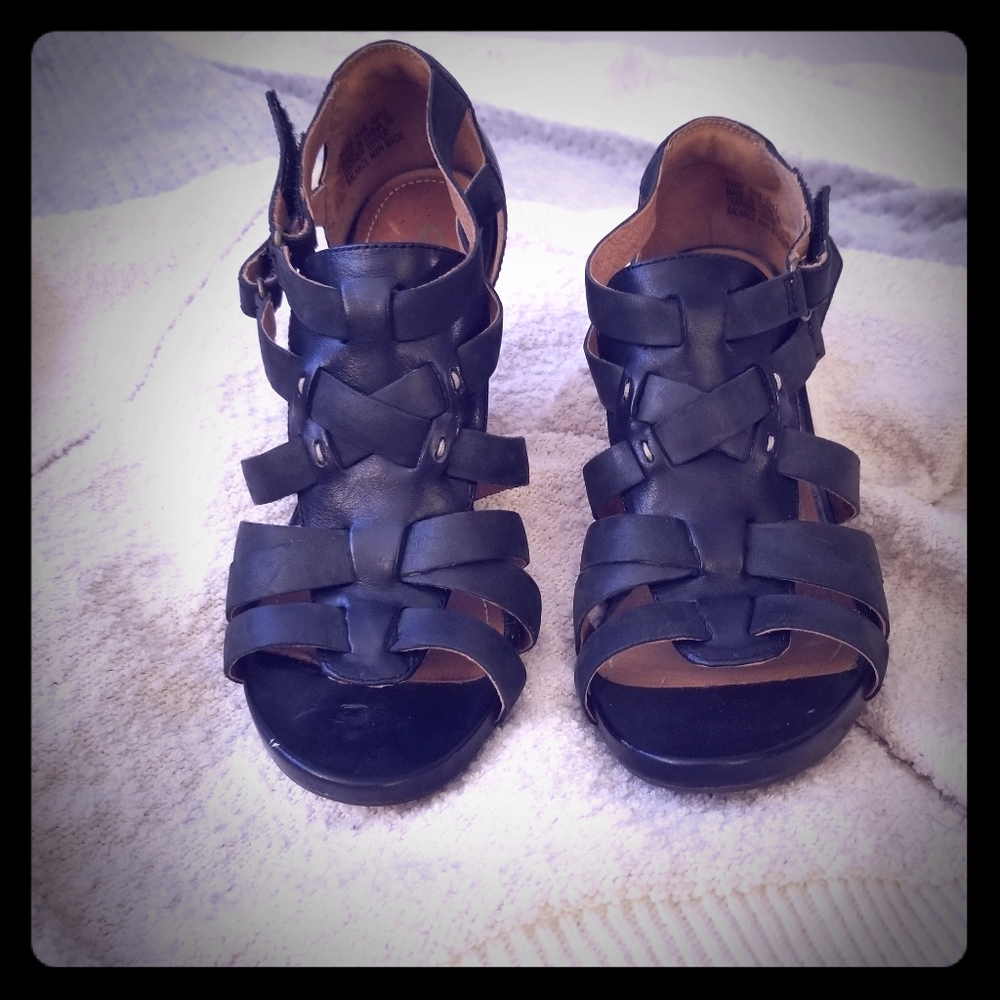 Black heeled ankle sandals